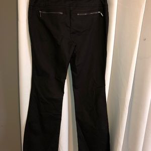 Black INC pants with zippers on back pockets